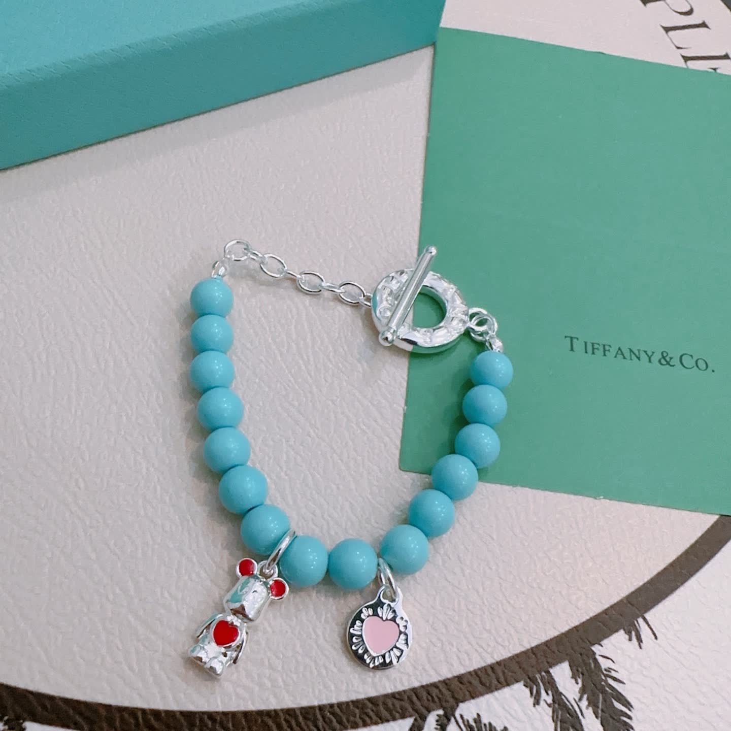Tiffany & Co. Blue Bead Bracelet with Charms